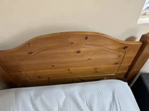 Single wooden framed bed