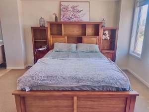 Bedshed Queen size bed with two bedside table and a tallboy