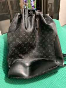 Mens Louis Vuitton backpack preowned but unused . bought for $6000