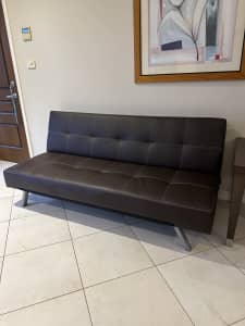 Leather look sofa / lounge - folds into bed 