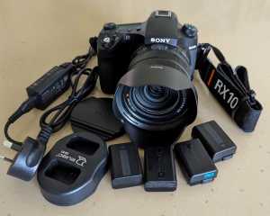 Sony RX10 Mark IV with 5 batteries and charger (perfect condition).