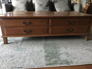 Solid wood coffee table with wide double sided drawers 