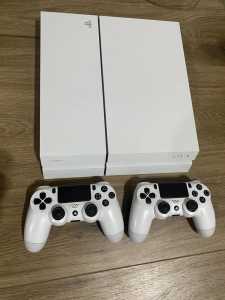 PlayStation 4 (white) and 2 x controllers