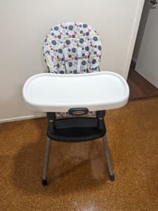 High chair convertible to booster. Graco