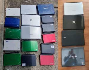 20 laptops for parts . some work. some not. missing pieces., total $20