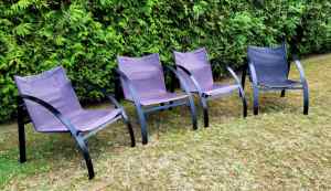 4 x black fabric backed leisure chairs