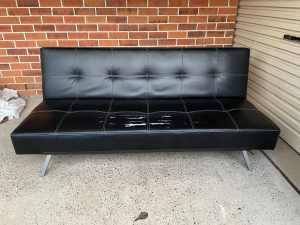 black faux leather sofa bed