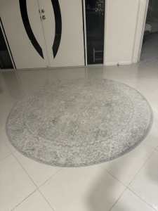 Grey round rug