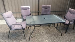 Outdoor glass table and 4 chairs