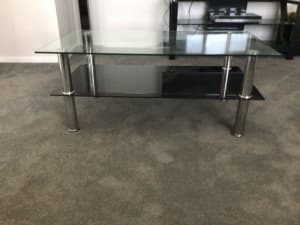Glass coffee table, chrome legs