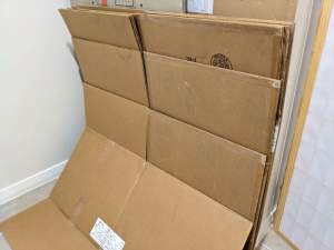 Cardboard moving boxes, used