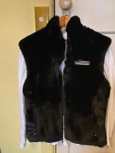 Fully reversible Ladies Spyder brand apres ski vest