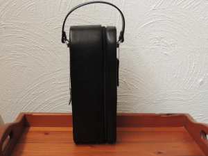 Single black leather wine bottle carry case w opener pouch