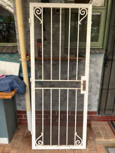 Old fashioned security screen door.