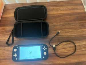 Nintendo Switch Lite with charger and case