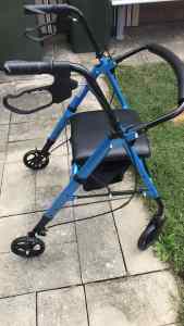 Mobility walker with hand brakes
