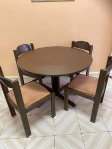 Solid timber round table and 4 chairs