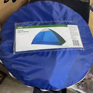 Pop up beach shelter tent. New/not used.