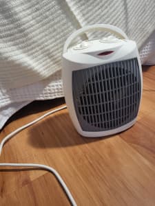 essentials upright fan heater