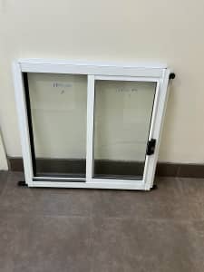 600Hx610W White aluminium sliding window:located in wetherill park