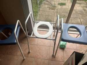 Disability toilet help seats, centre is new others not used much.