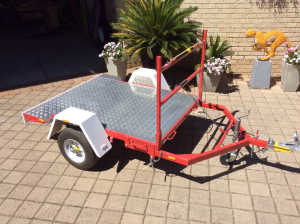 Custom built flat top trailer offered at cost