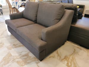 BRAND NEW 2 seater grey fabric sofa
