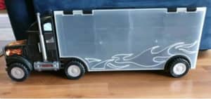 Hot Wheels Car Carrier Truck. Holds 24 cars, 12 on each side. Space be
