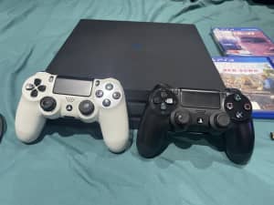 PS4 console 1TB with games - 2 controllers ✌️