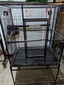 Bird cage: Extra large. Perfect for a parrot. Great condition