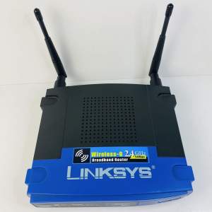 Linksys Wireless-G 2.4 GHz Broadband Router Modem 4-Port Switch