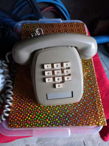 Vintage retro press button phone telecom