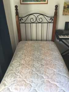 Solid timber single bed with slat base mattress
