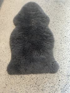 Adair’s charcoal sheepskin rug