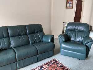 Three Piece Leather Lounge suite with recliner chairs