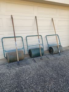 Lawn roller and soil spreader