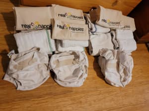 2 sets of cloth nappies for sale