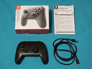 Official Nintendo Switch Pro Controller - Boxed in as-new condition