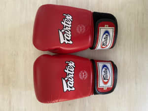 Fairtex boxing gloves and shin guards