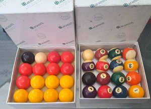 TWO SETS OF SNOOKER AND BILLIARD BALLS MADE BY A