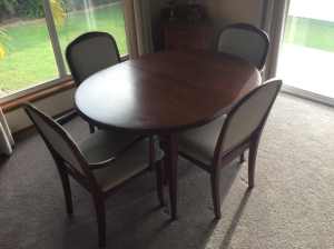 Parker extendable dinning table and four chairs