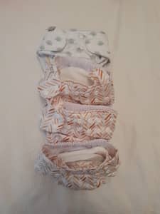 Reusable baby nappies brand new (four sold together)