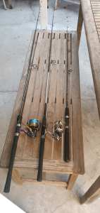 3 Fishing rods and tackle box