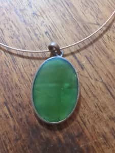 Retro green stone necklace mounted on copper coloured metal 
