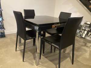 Dining table can be extended glass and steal
