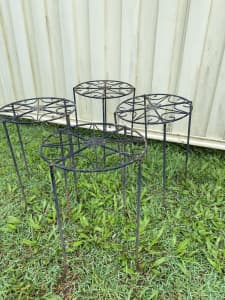 4x pot plant holders. Used. Metal. Some rust.