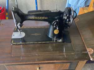Early Singer Sewing Machine and Cabinet