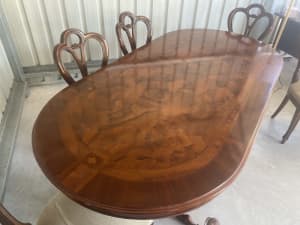 Antique dinning table and chairs