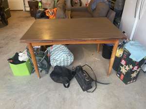 Extendable wooden dinning table.