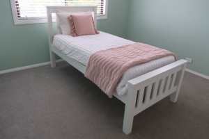 White single bedframe and mattress
